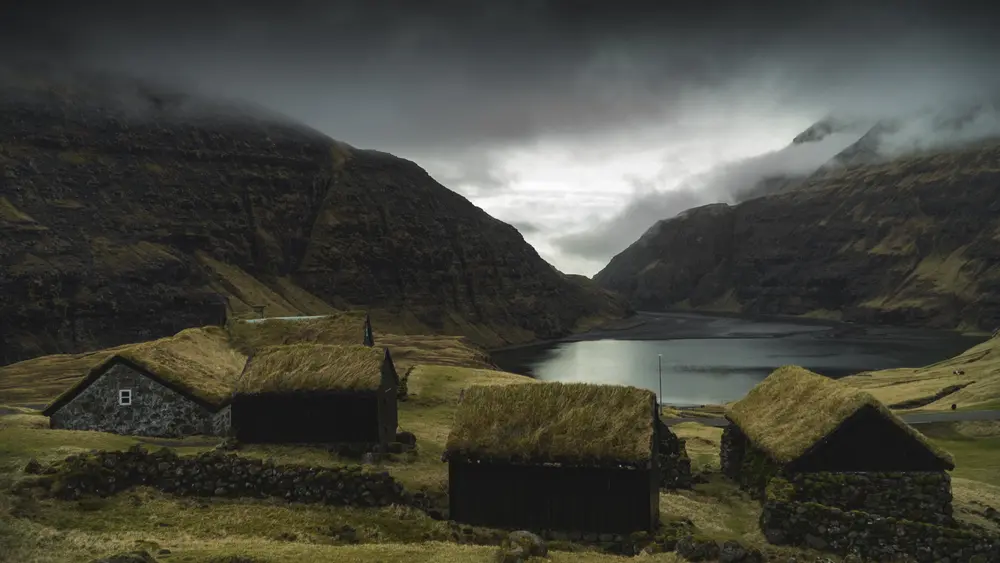 Grass-roofed houses on the Faroe Islands. Downloaded from Wallhaven. Author and rights unknown - please get in touch for crediting, or if there's any issue.